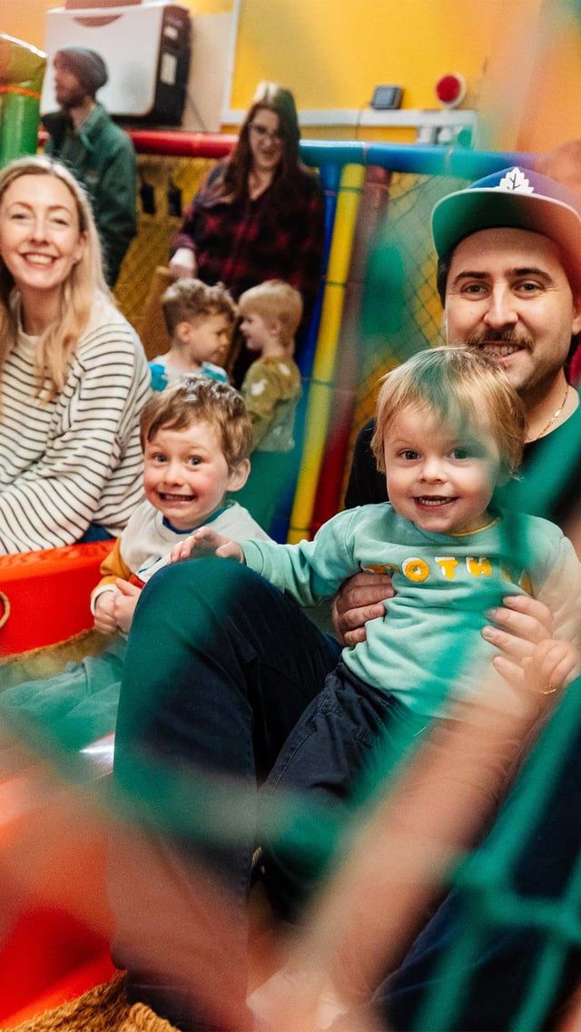 Image of family on the slides portrait mob 1920x1080