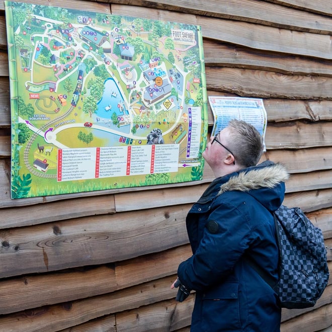 Image of daventry hill pupil child looking at map web square