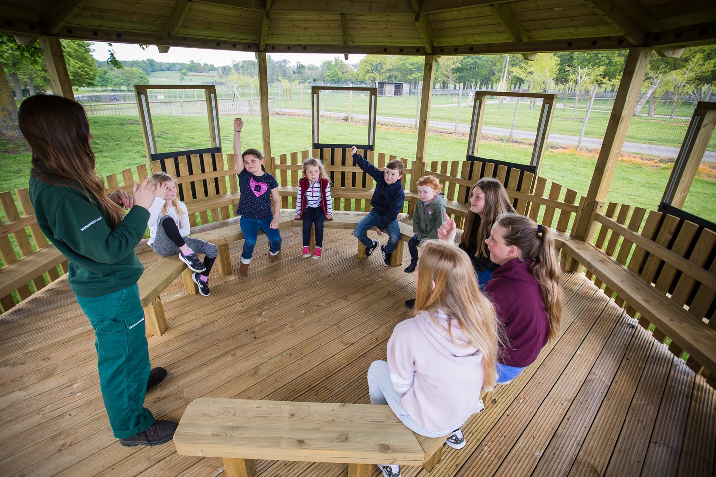 A group of children enjoy an educational session in Woburn Safari Park's outdoor classroom