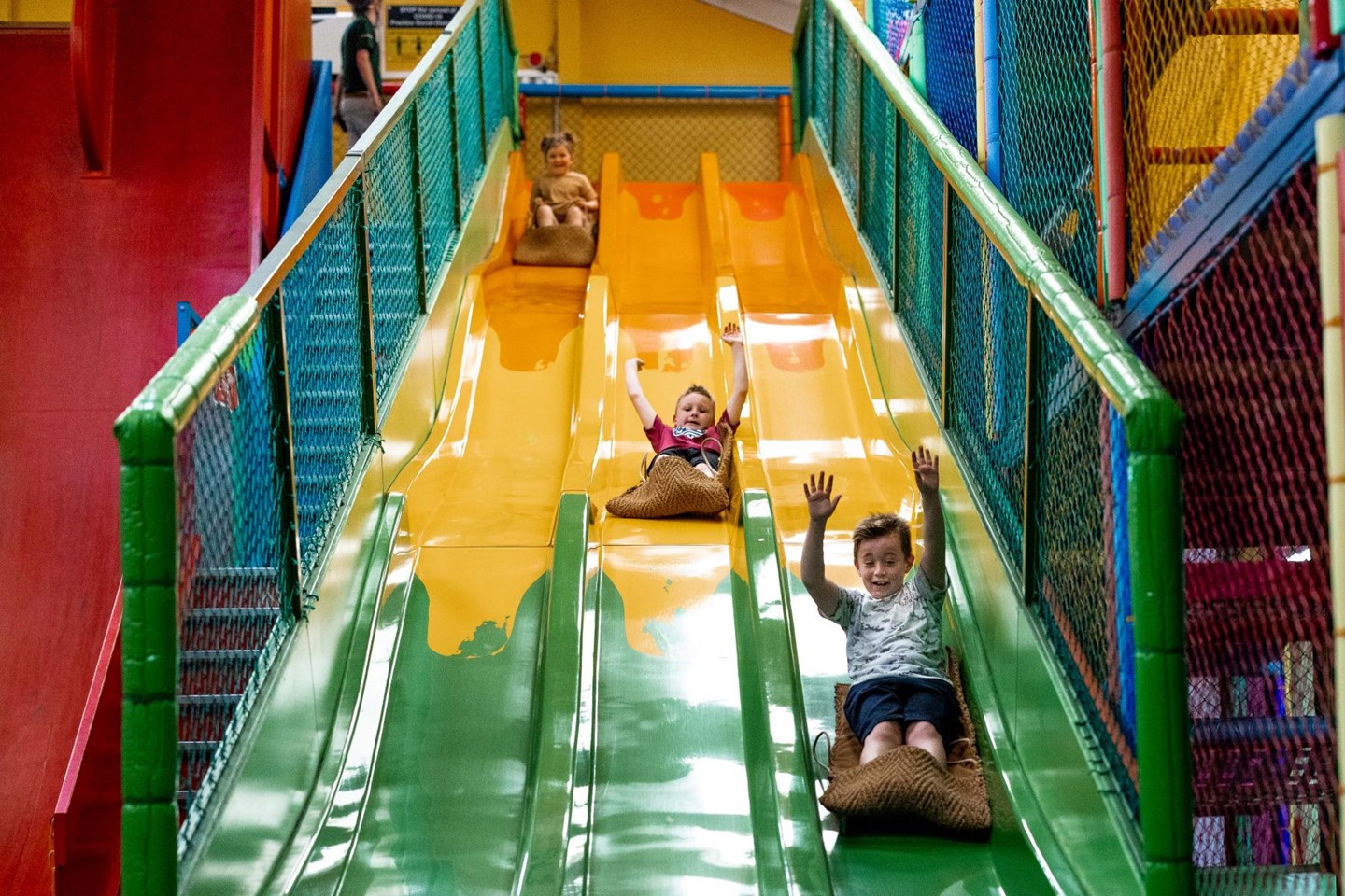 Image of children on slide in indoor play area mammoth play ark